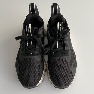 Reebok black running shoes with leopard print, women’s size 6